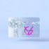 VELVET GLOW Geschenkkarte per Post mit holografischer Schleife